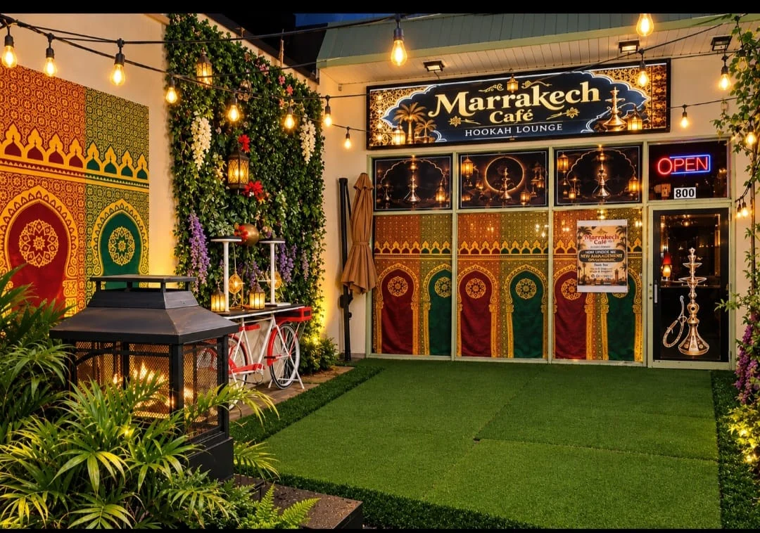 Marrakech entrance with patterned doors and greenery